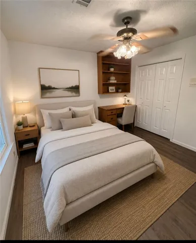 Well-lit sleeping quarters with a built-in bookshelf and ample storage options.