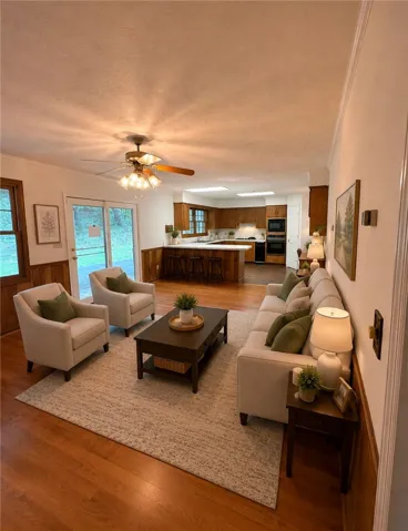 An inviting open-concept area blends living space with a well-appointed kitchen.
