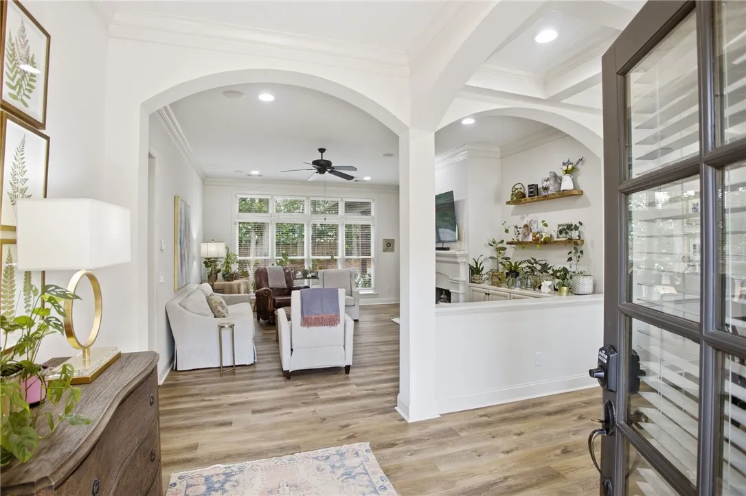 Enter into a bright, open living area showcasing a harmonious blend of style and comfort.