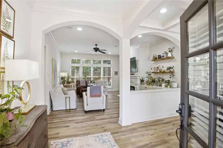 Enter into a bright, open living area showcasing a harmonious blend of style and comfort.