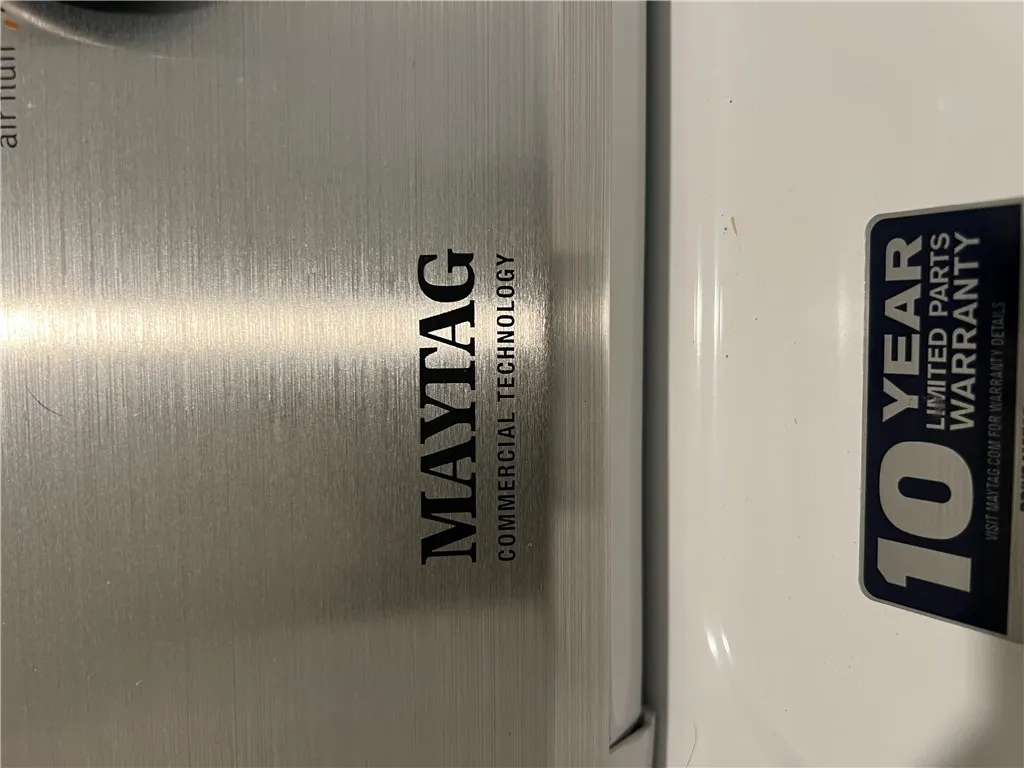 Essential appliances include a durable Maytag commercial technology washer, ensuring laundry day efficiency.