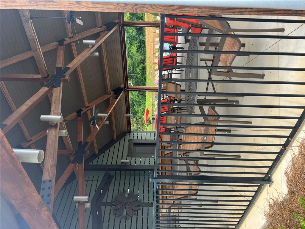 A charming covered patio, ideal for outdoor entertaining and relaxation.
