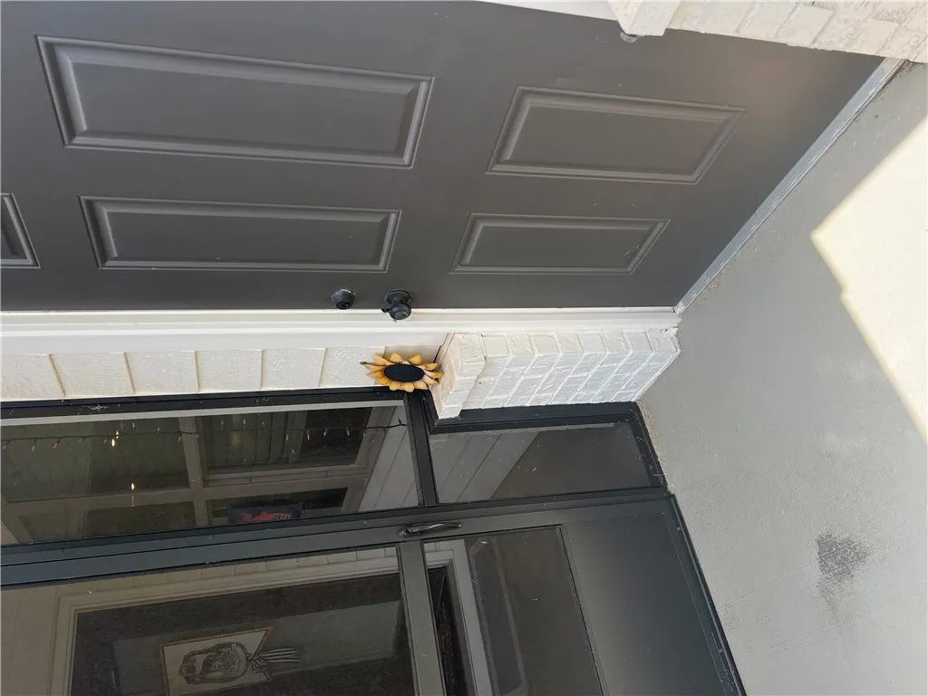  Easy no step entry from the spacious 1 car garage.Secure entry point with a paneled main door and a clear storm door providing light.