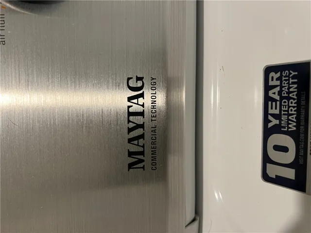Essential appliances include a durable Maytag commercial technology washer, ensuring laundry day efficiency.