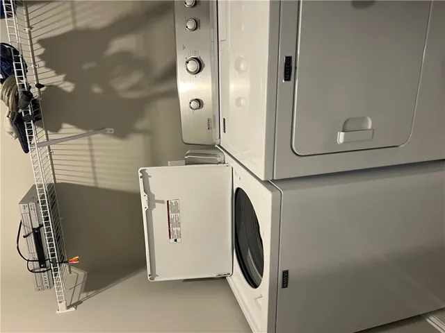 Efficient Maytag washer and dryer stack for streamlined laundry.
