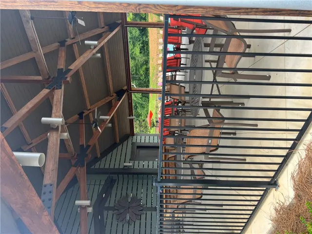 A charming covered patio, ideal for outdoor entertaining and relaxation.