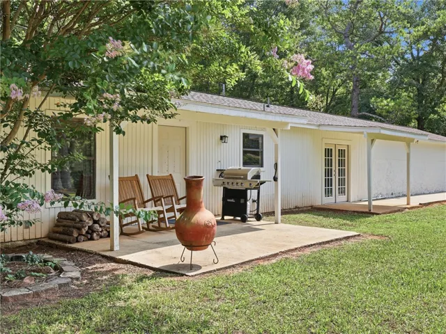 A spacious backyard patio with ample room for outdoor entertainment and relaxation.