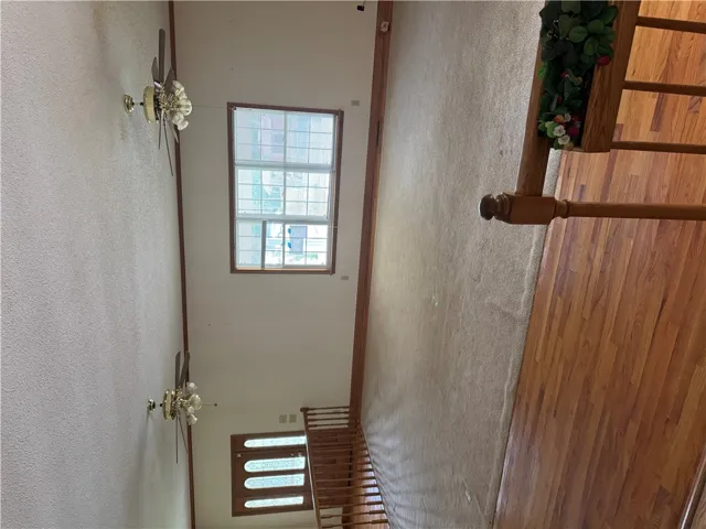 Two elegant ceiling fans adorn this spacious interior, providing comfort and style.