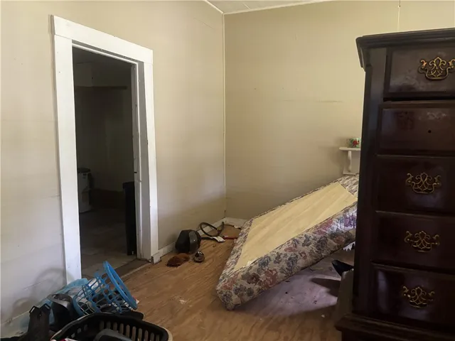 A well-lit room with simple trim around the doorway.