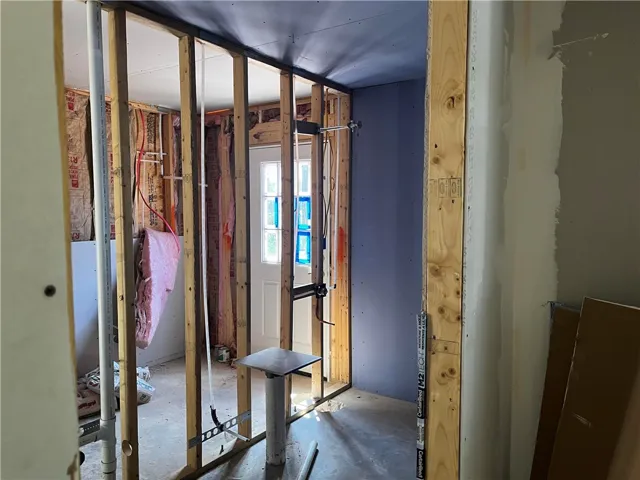 Framed interior walls await finishing touches in this construction-phase home.