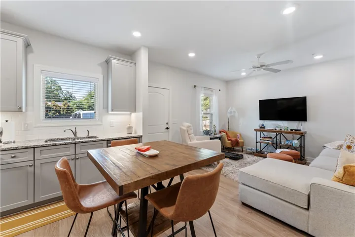 An open-concept living space integrates a well-appointed kitchen with inviting entertainment areas.