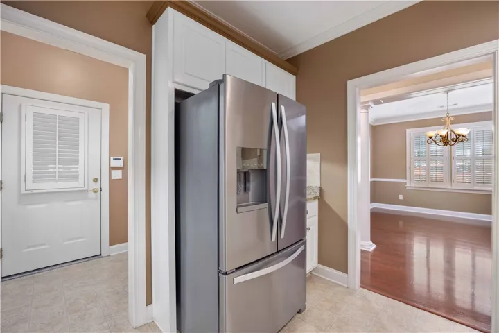 A well-appointed kitchen entry offers seamless access to other living areas.