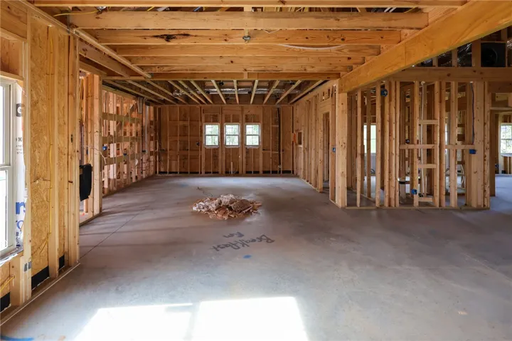 An open floorplan layout takes shape during the framing phase of construction.