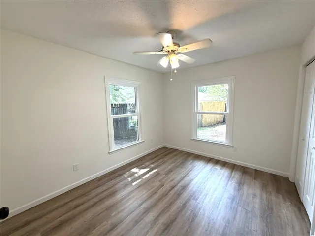 A restful bedroom with durable flooring and excellent light awaits your personal touch.