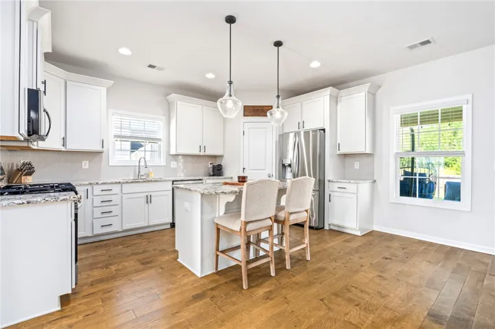 Kitchen with island and coffee bar