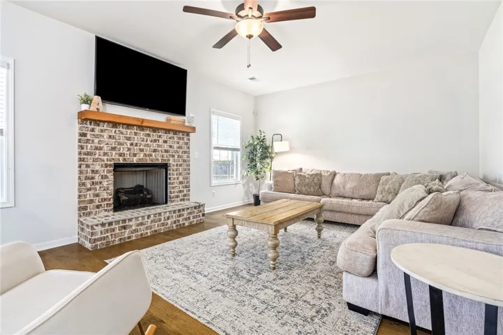 Living room with bricked fireplace