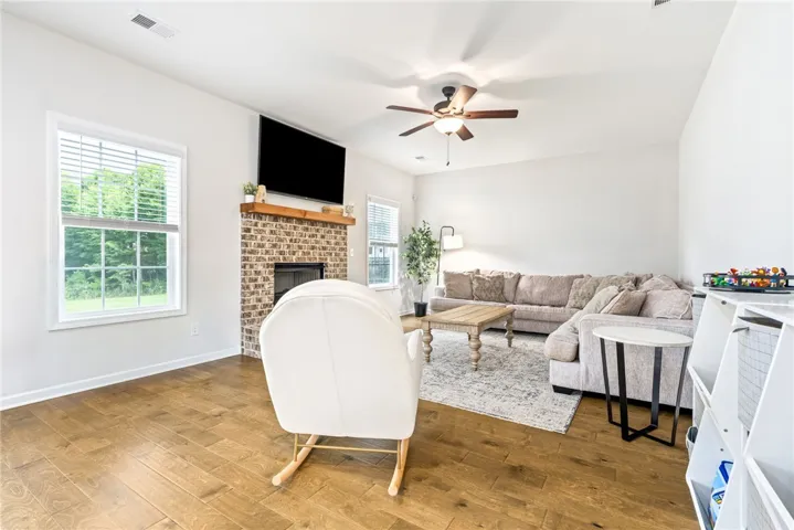 Living room with bricked fireplace