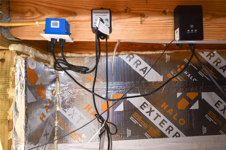 Essential infrastructure and thoughtful insulation create a well-maintained, functional space.
