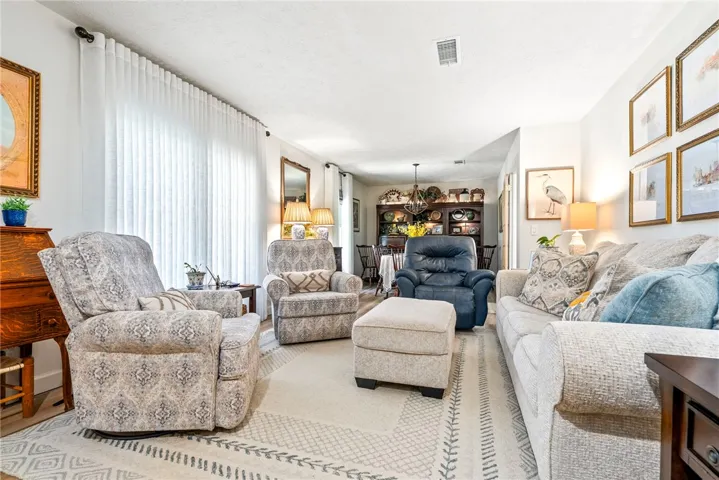 A comfortable living area flows seamlessly into a dedicated dining space.