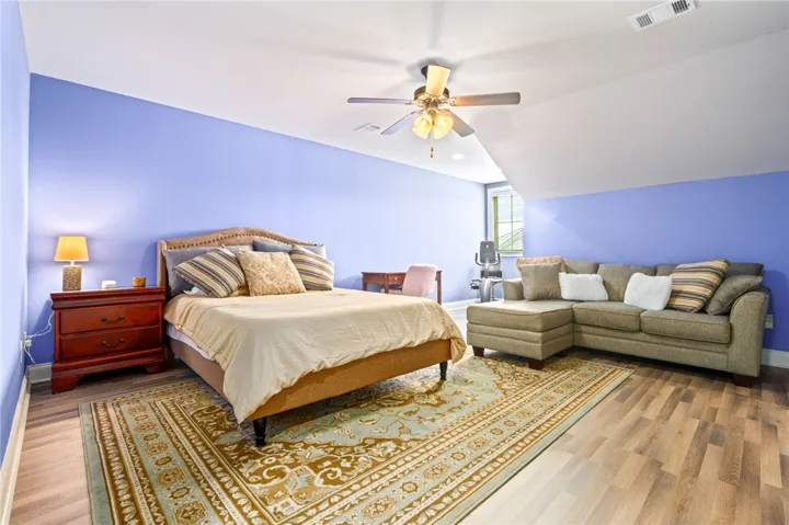 A spacious room upstairs can be used as a bonus room or an extra bedroom.