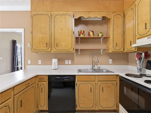 Functional kitchen with ample cabinetry and a practical layout.