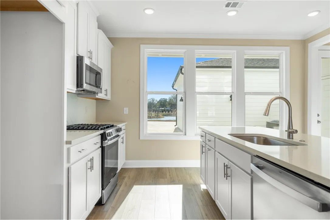 Photos are not of subject property. Photos are the same floorplan of a completed home in the community