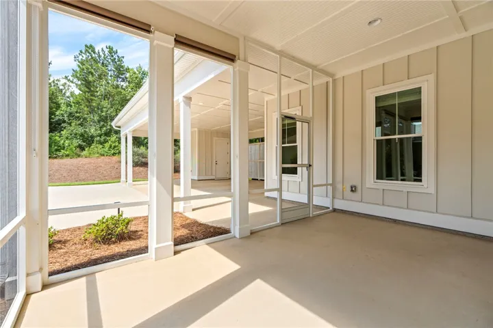 Spacious screen porch makes the perfect place to relax