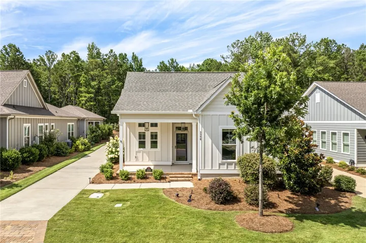 Welcome to 3398 Eagle Trail - a move in ready home tucked in the quaint setting of National Village.