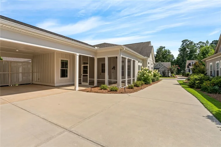 Spacious screen porch makes the perfect place to relax