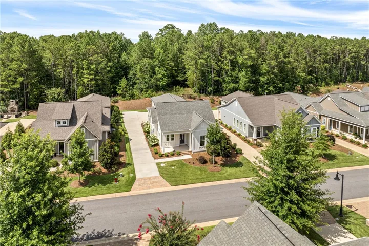 Welcome to 3398 Eagle Trail - a move in ready home tucked in the quaint setting of National Village.