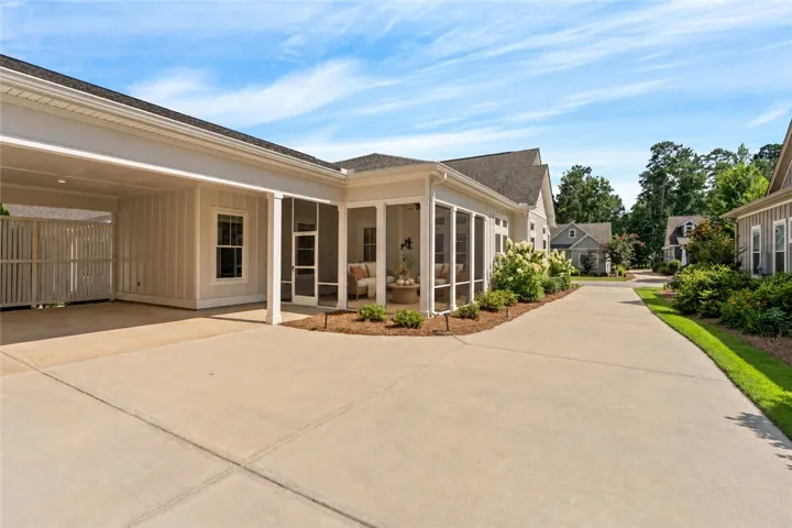 A screened back porch is the perfect spot to enjoy a crisp fall morning or evening.