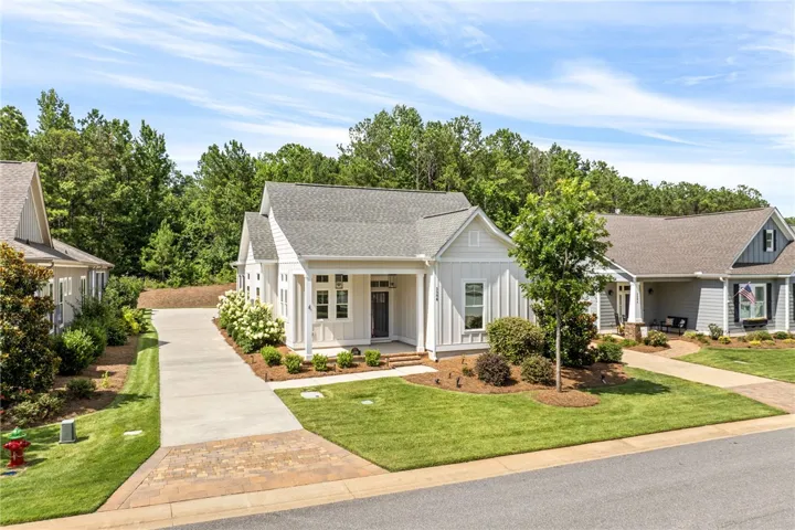 Welcome to 3398 Eagle Trail - a move in ready home tucked in the quaint setting of National Village.