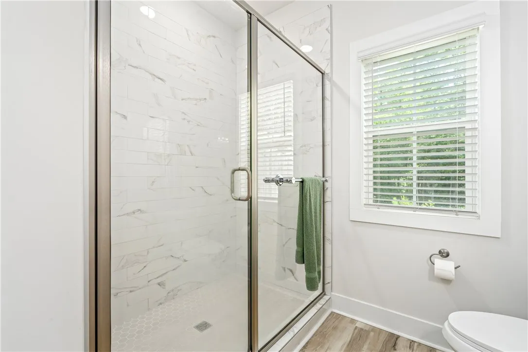 Spacious, tiled shower in Primary Bathroom