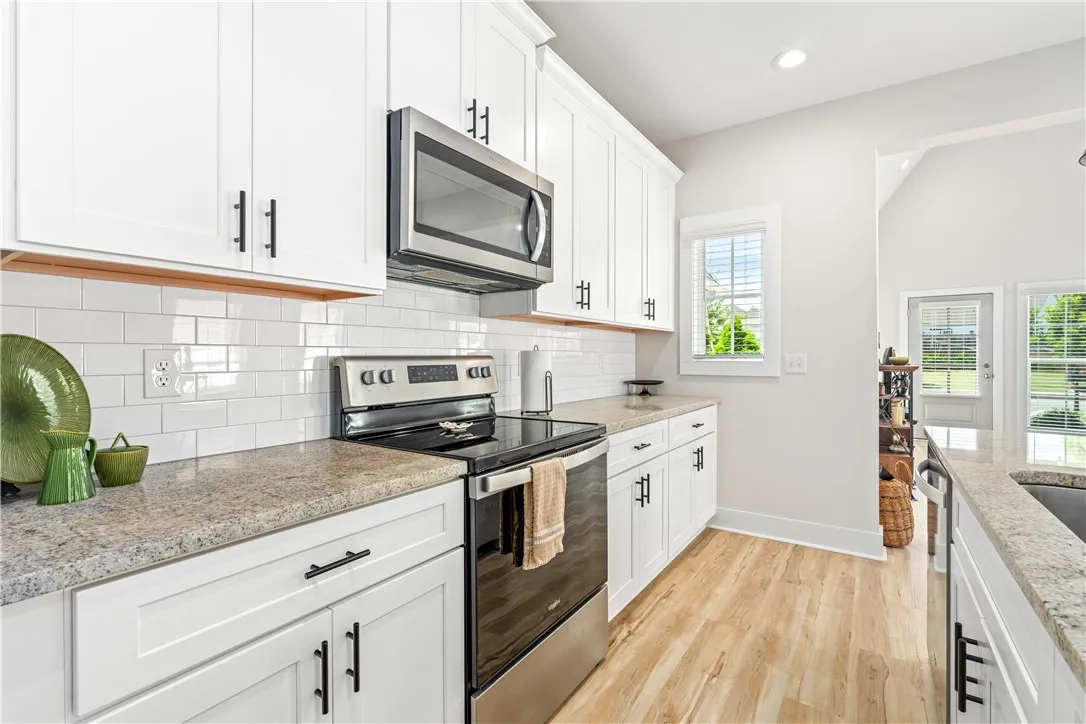 Kitchen open to Dining and Living Area