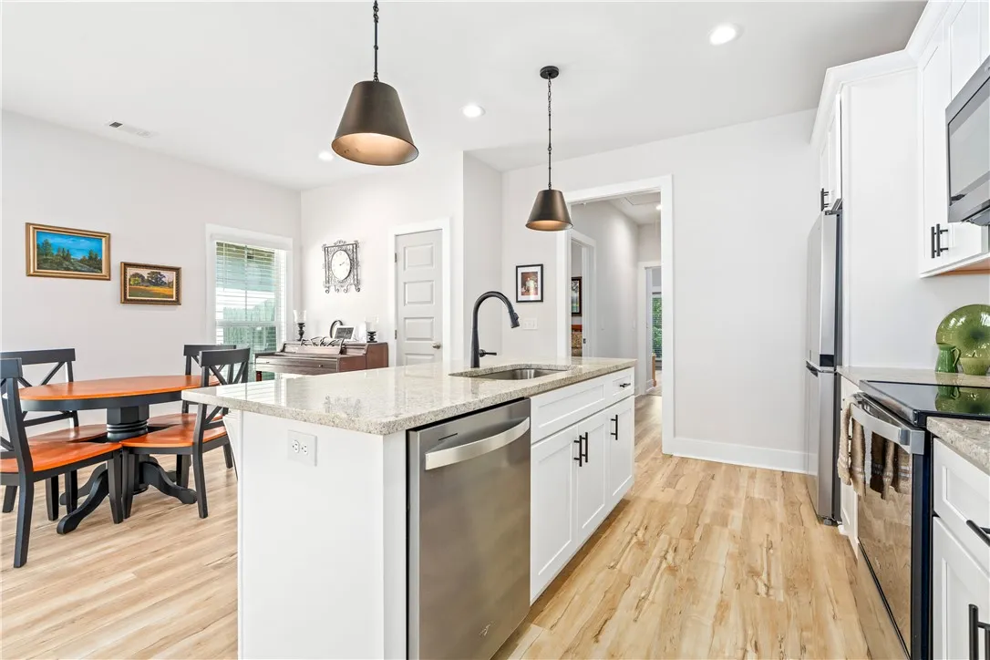 Kitchen open to Dining and Living Area