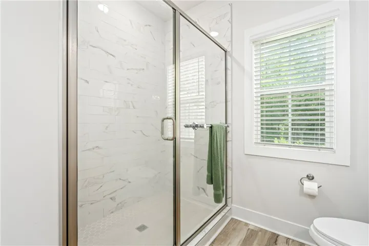 Spacious, tiled shower in Primary Bathroom