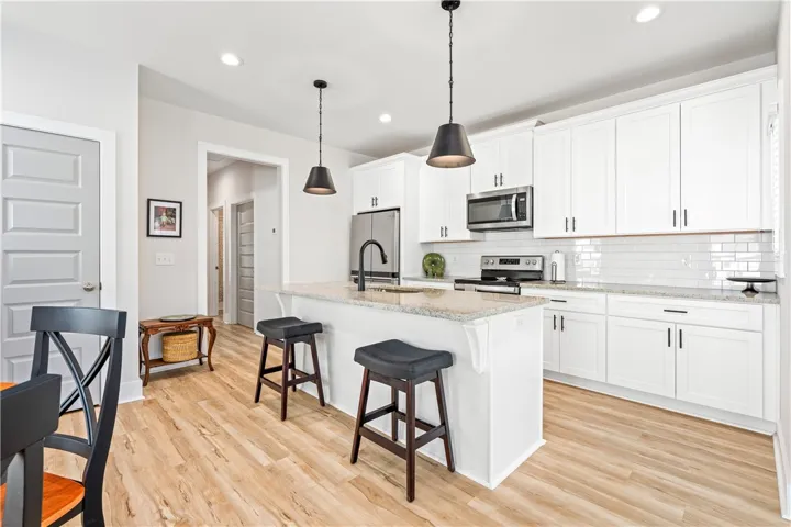 Kitchen open to Dining and Living Area