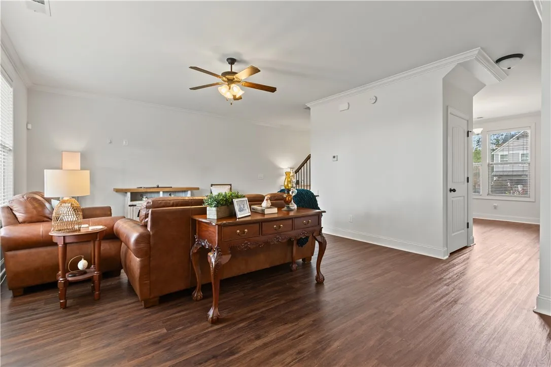 Living room, under the stairs storage closet, and dining room