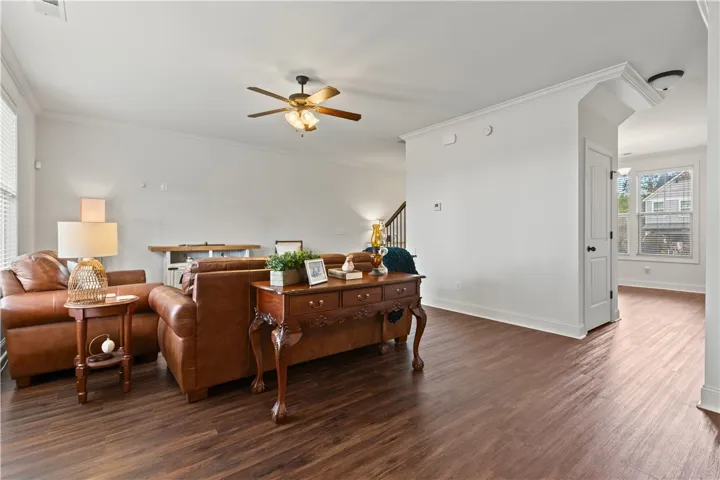 Living room, under the stairs storage closet, and dining room