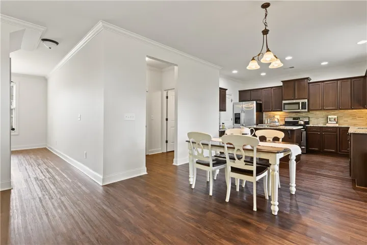 Second dining area and view of entry area from the garage.