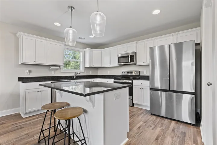 Beautiful kitchen with island and walk in pantry