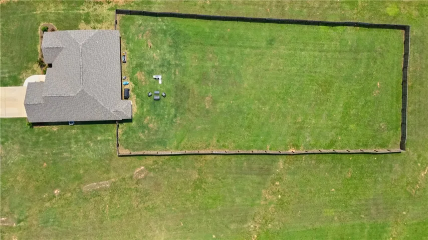 Almost an acre lot with fenced rear yard