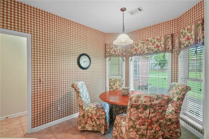 Breakfast room in the kitchen overlooking the backyard
