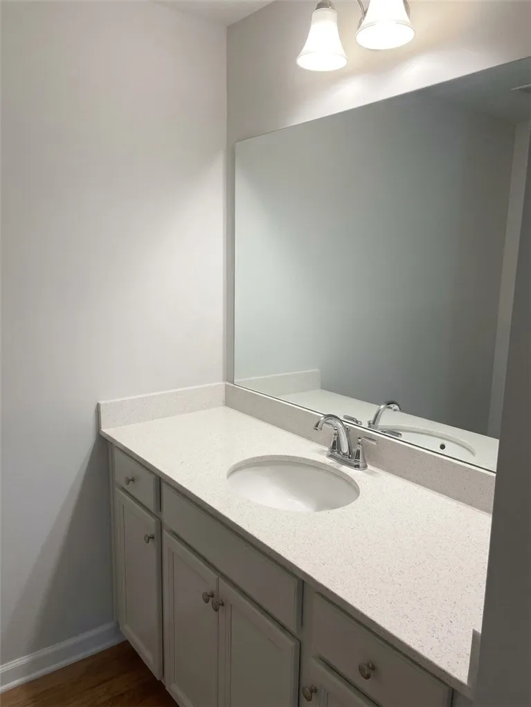 A well-appointed bathroom vanity with a spacious counter and ample storage below.