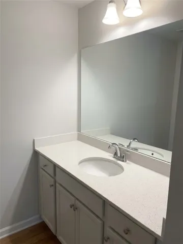 A well-appointed bathroom vanity with a spacious counter and ample storage below.