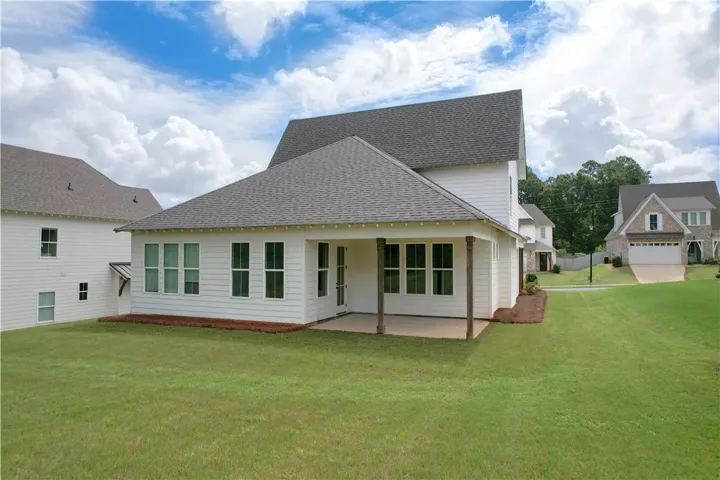 Covered back porch and level yard space