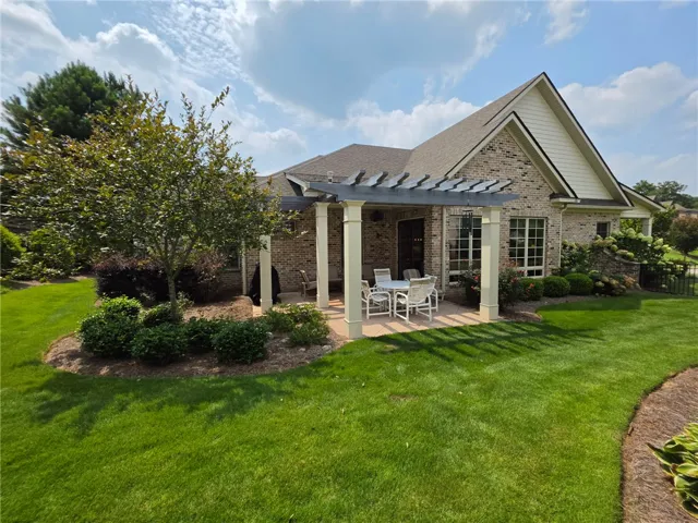 Covered Patio viewed from the lovely landscaped yard!