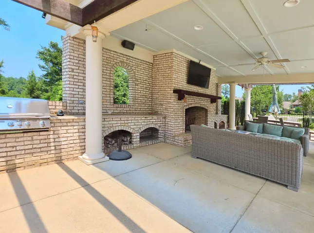 Clubhouse outdoor fireplace by the pool