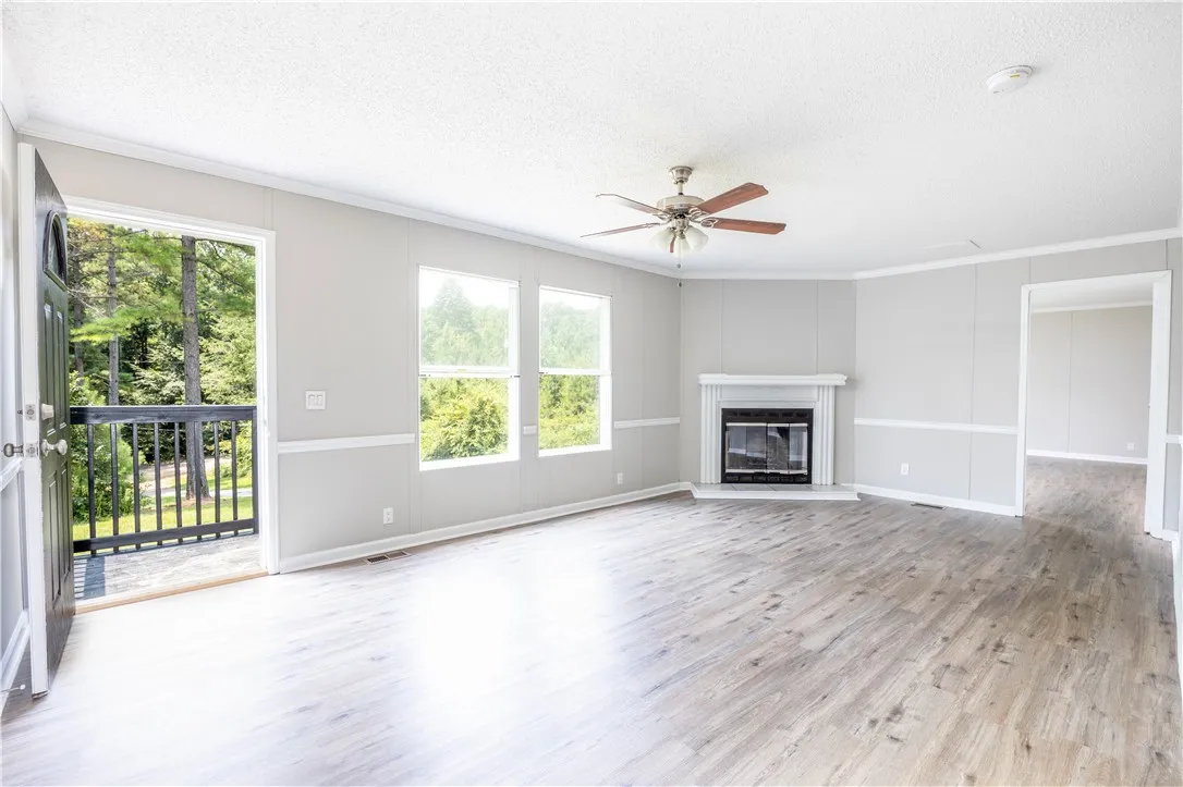 New paint, flooring, fixtures. Fireplace is Decorative