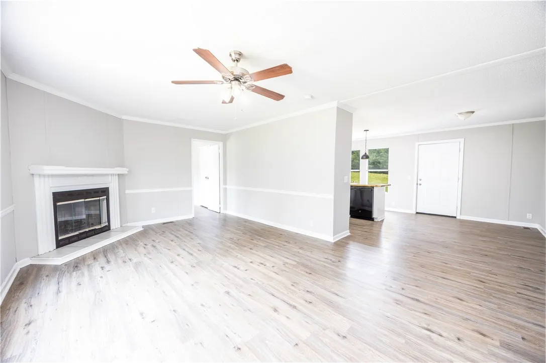 New paint, flooring, fixtures. Fireplace is Decorative